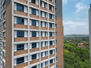 Instalação de cerâmica da fachada e execução de textura