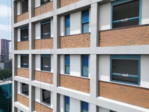 Instalação de cerâmica da fachada e execução de textura